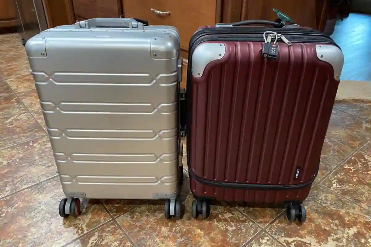 Premium aluminium hard-shell suitcase with metal latches, durable but heavy option for frequent travellers.