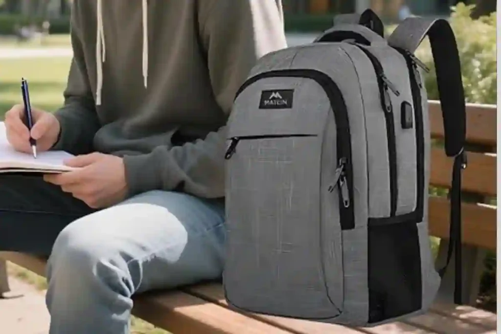 Best Lightweight Laptop Backpacks for Travel & Commute (2025) 19 Matein travel laptop backpack with slim design and built-in USB charging port.