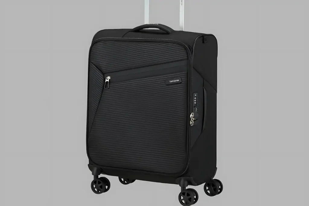 Hard vs Soft Suitcase: Which One Is Actually Right for You? 2 Soft shell suitcase with exterior pockets demonstrating flexible fabric design and easy access storage