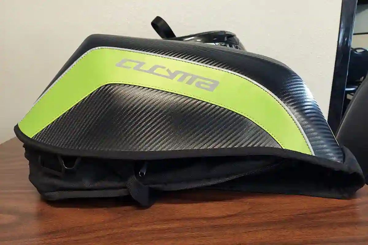 Best Hard Shell Backpacks of 2025 (For Laptops, Riders & Tech)- Cucyma carbon fiber hard shell backpack with reflective strips and ergonomic padded straps, ideal for riders.