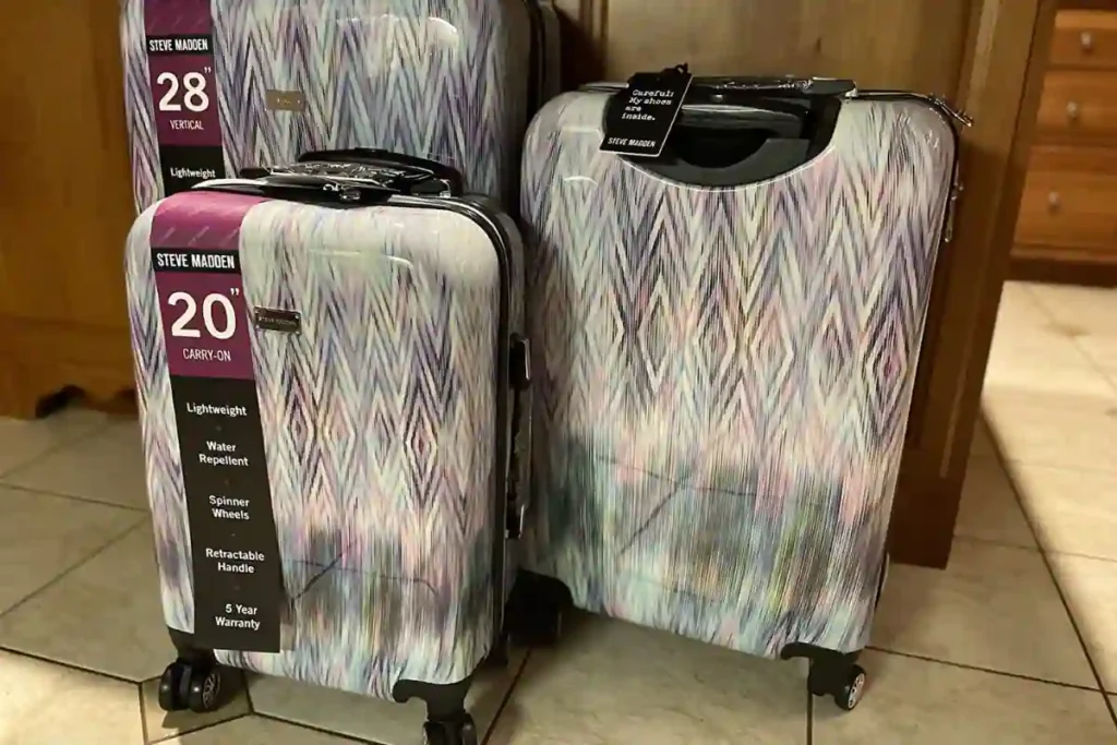 Fashion-forward Steve Madden Diamond three-piece luggage set with smooth spinner wheels.