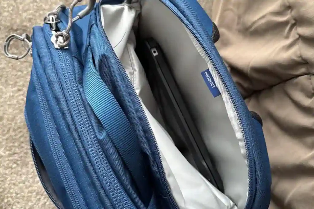 A laptop backpack shown with callouts for sleeve size, internal volume, and torso fit, demonstrating the key measurements for selecting a well-fitting bag.