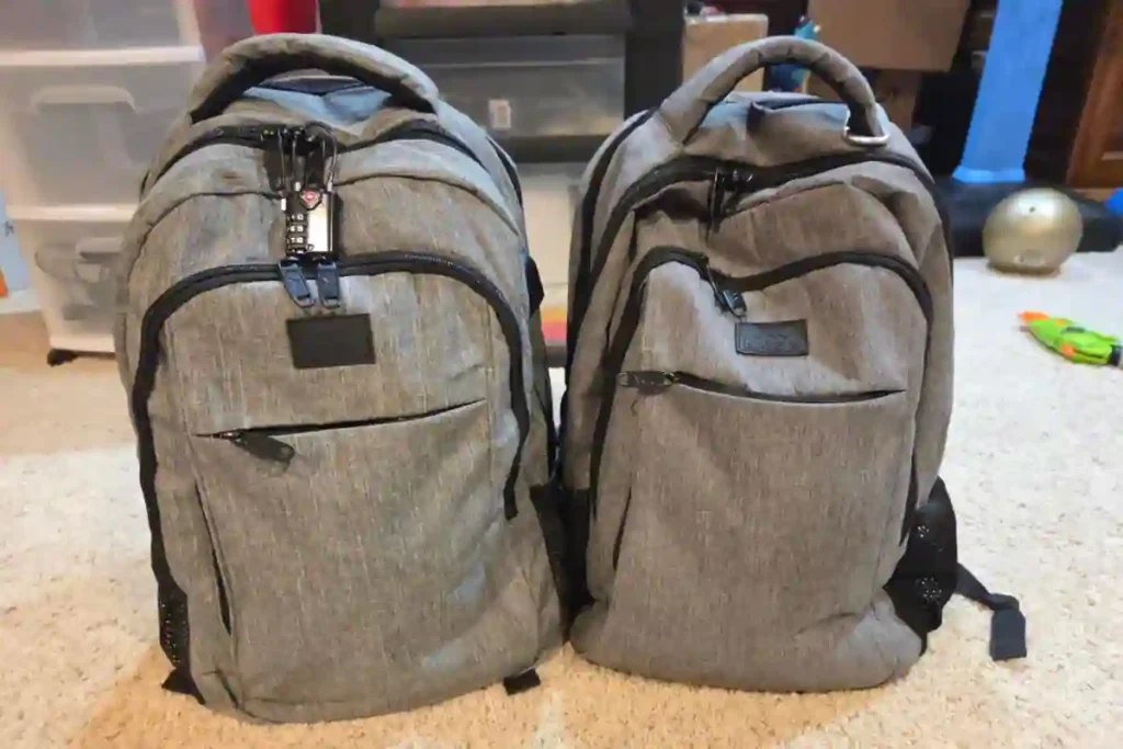 MATEIN 35L laptop backpack with USB charging port and multiple compartments shown in black.