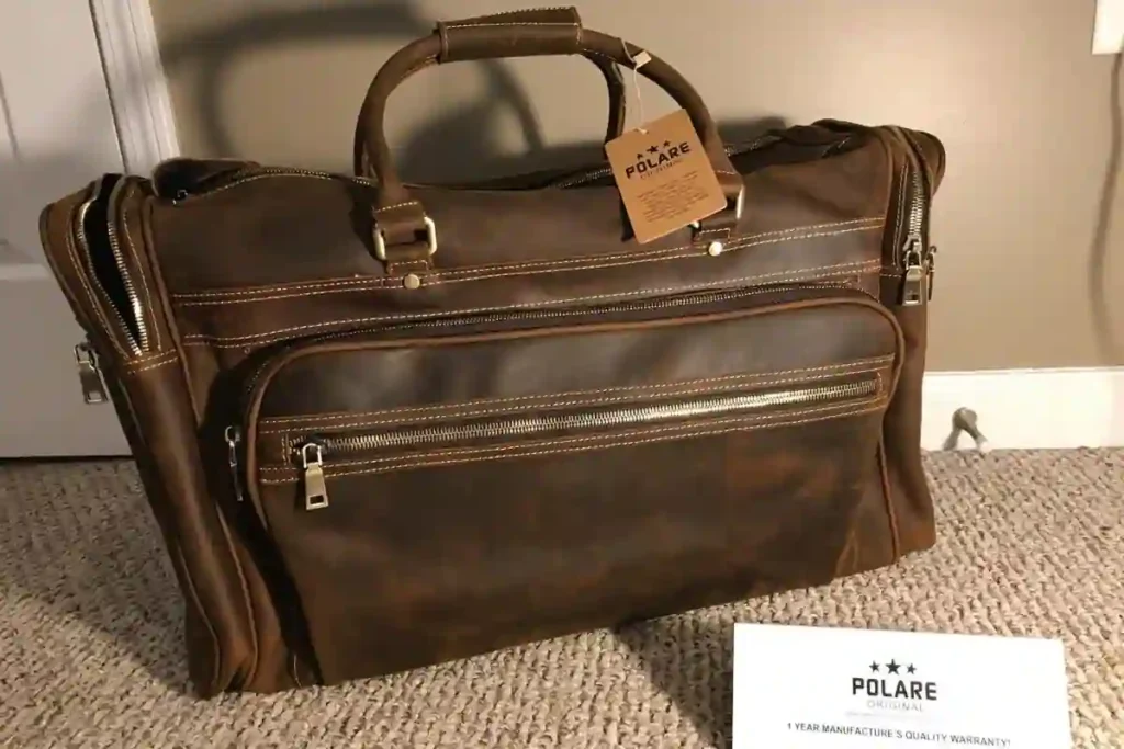 Best Leather Duffel Bags of 2026: Expert Picks for Travel, Work & Weekend Trips 8 Large Polare Italian leather duffel bag with double-stitched handles and deep brown patina.