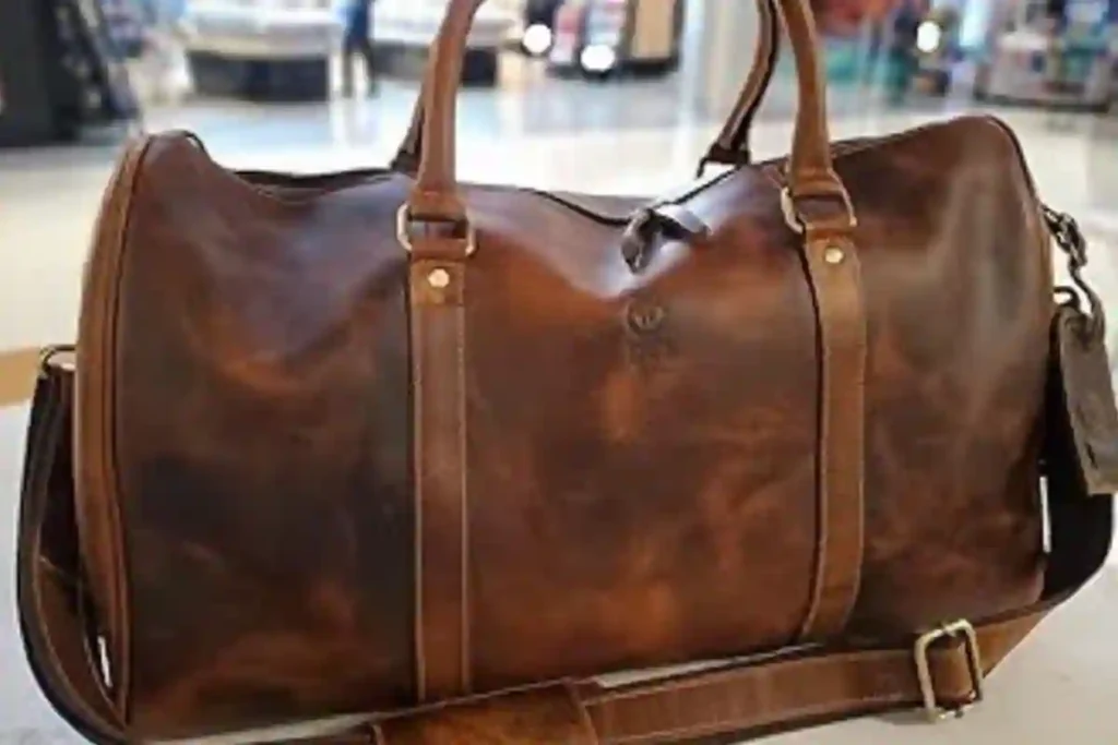 Best Leather Duffel Bags of 2026: Expert Picks for Travel, Work & Weekend Trips 6 Compact Rustic Town buffalo leather underseat duffel bag designed for short trips and airline underseat storage.