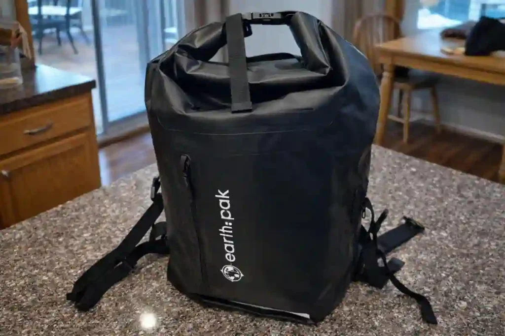 Best 35L–40L Carry-On Travel Backpacks for Flights (2026 Tested Guide) 3 Earth Pak Roll-Top Closure Bag — Best Waterproof Travel Backpack
