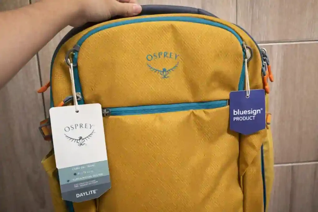 Osprey Daylite Carry-On Travel Pack 35L Review – Lightweight & Practical 1 Osprey Daylite 35L backpack front pockets open, showing admin-style organization pocket and quick-access pocket for travel essentials -Osprey Daylite Carry-On 35L Review