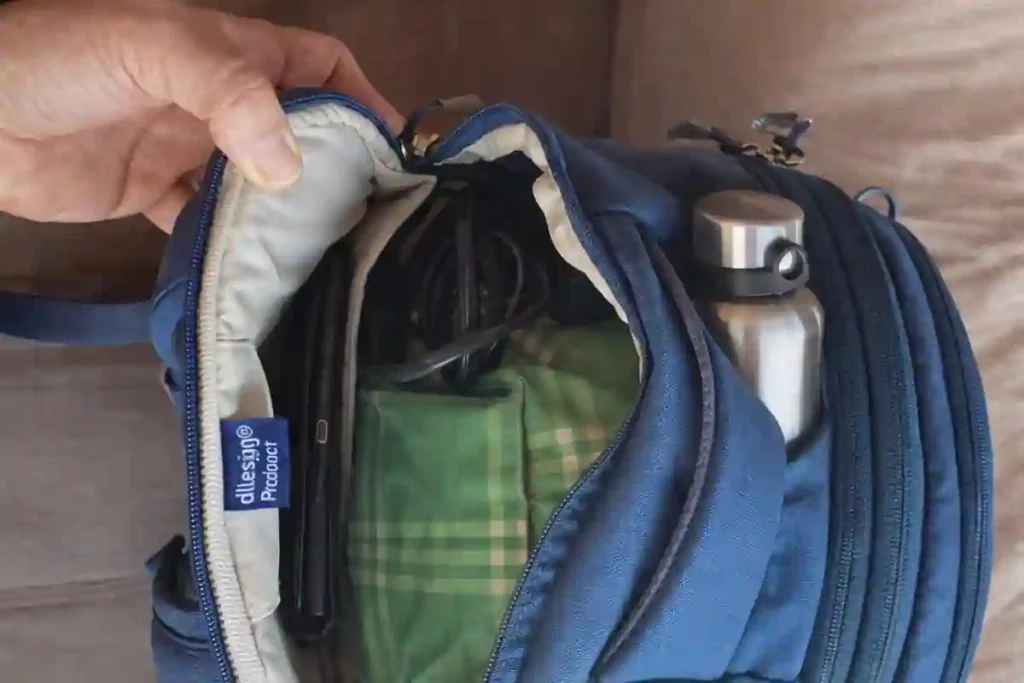 Osprey Daylite 26+6 Review: Is This the Best Travel Backpack for One Bag Travelers? 5 A full 3-day travel packing list including clothes, toiletries, and tech laid out next to the Osprey 26+6.