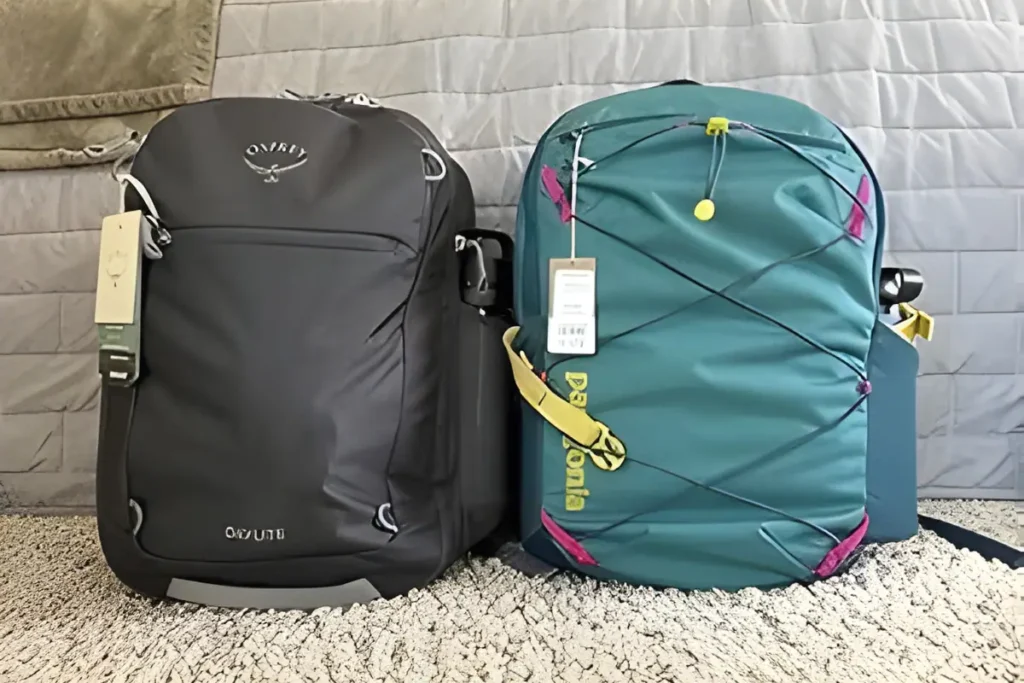 Osprey Daylite 26+6 Review: Is This the Best Travel Backpack for One Bag Travelers? Front view of the Osprey Daylite Expandable 26+6 travel backpack in Black against a travel background.